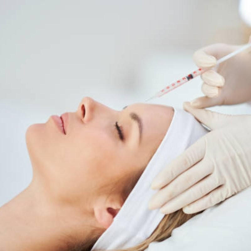 A scene of medical cosmetology treatments botox injection. High quality photo